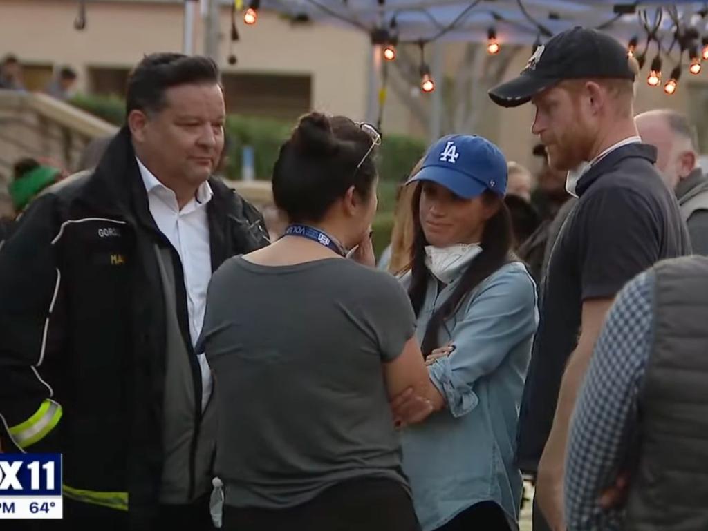 Prince Harry and Meghan Markle serving meals to wildfire victims