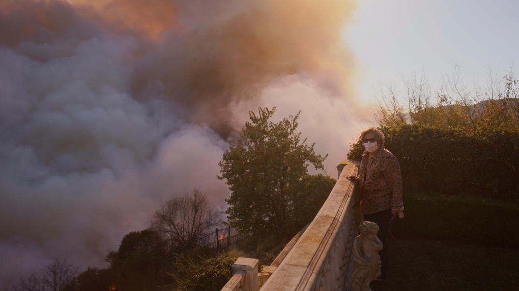 Firefighters working to control the wildfire amidst tough conditions