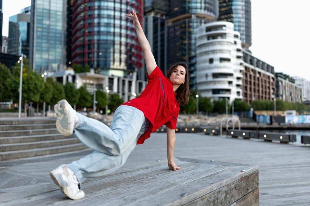 Rachael Gunn celebrating her love for dance in her living room, showing her continued passion for breaking even outside of competition