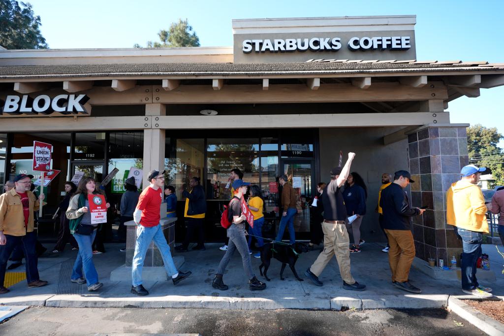 Starbucks workers on the picket line urging for better pay and conditions