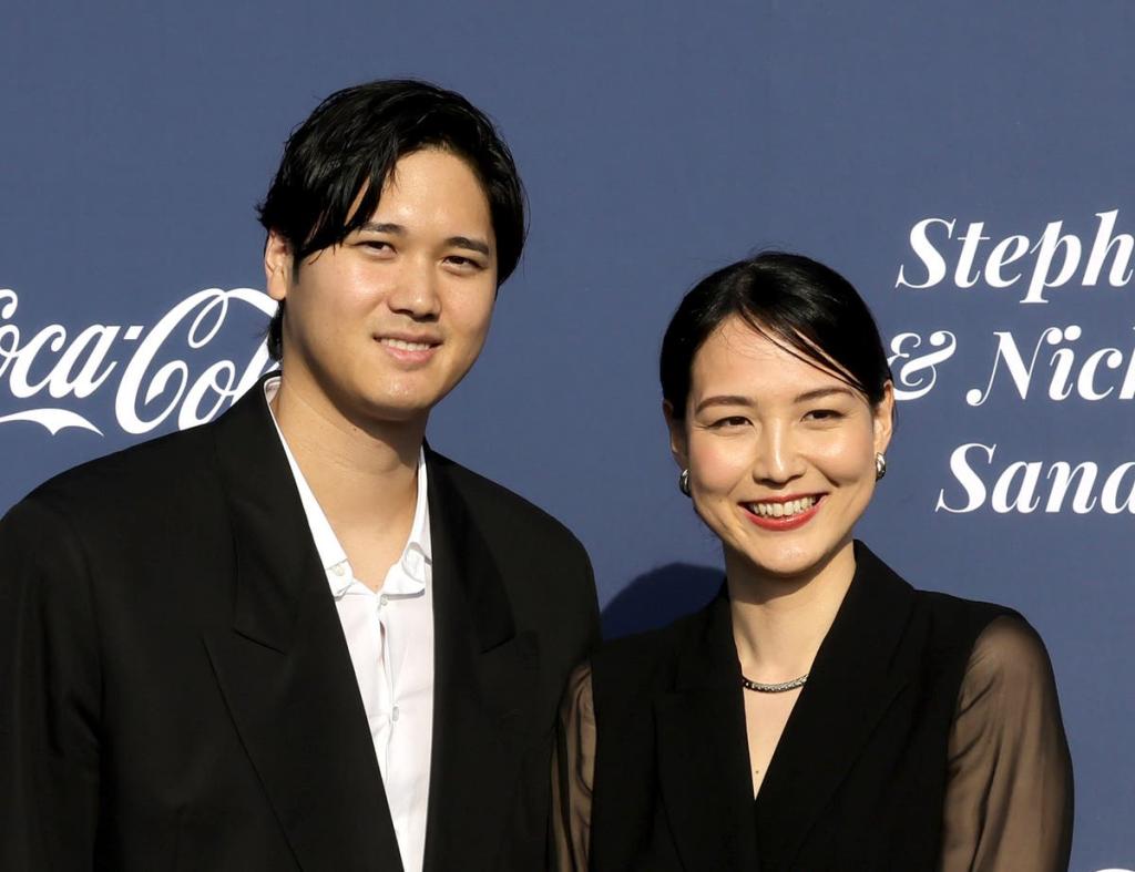 Shohei Ohtani smiling while looking at the camera