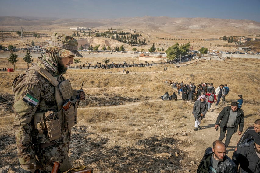 A mother searching desperately for her child at Saydnaya Prison