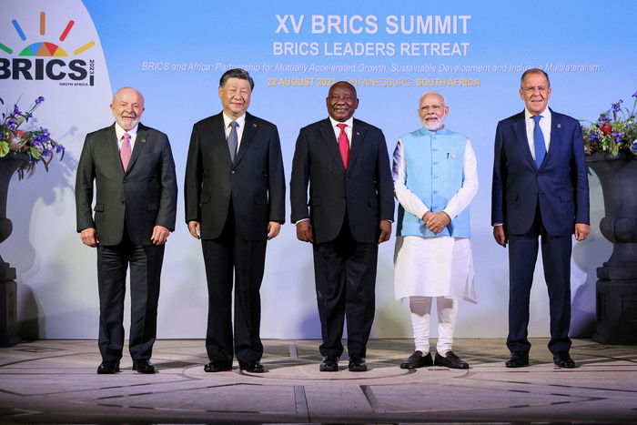 Indonesia's BRICS membership announcement with flags