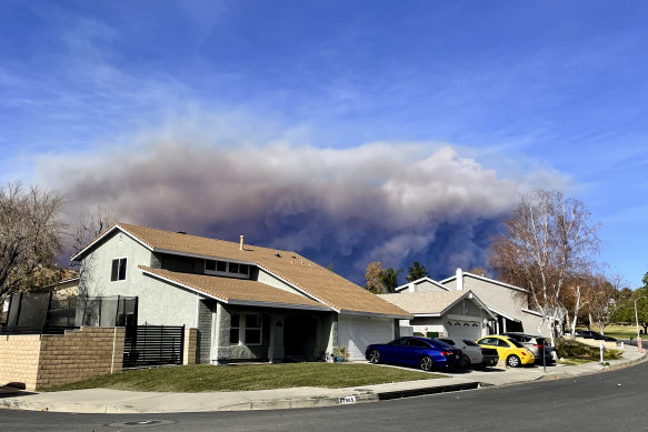 Smoke rising from a wildfire near Castaic Lake