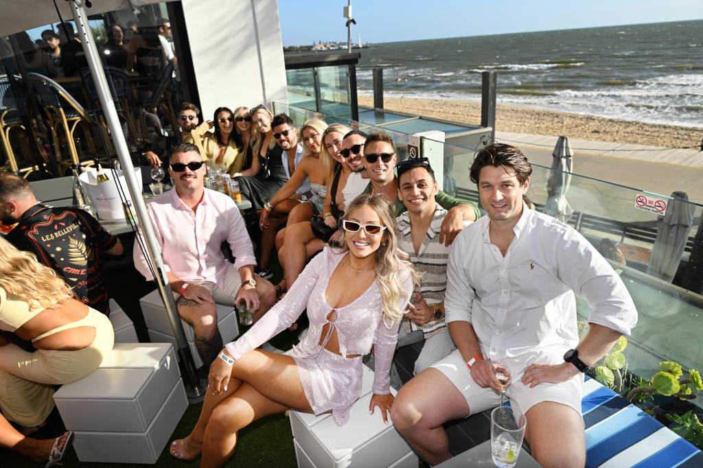 Crowds gathered in Melbourne for New Year’s Eve celebrations with fireworks in the background