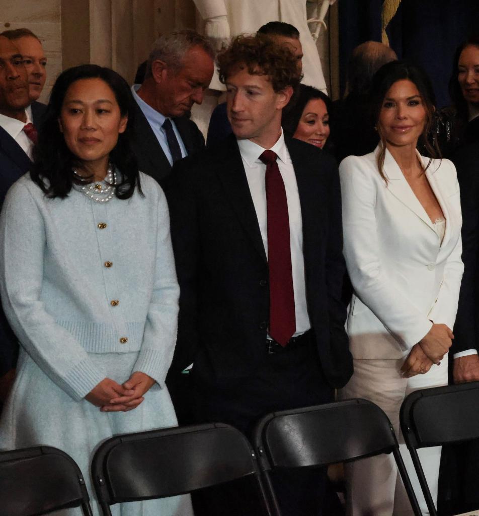 Melania Trump's striking navy outfit with a large hat at the inauguration