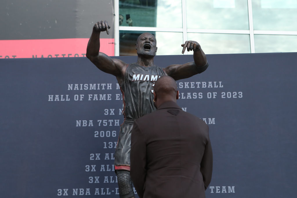 Dwyane Wade's statue with achievements listed