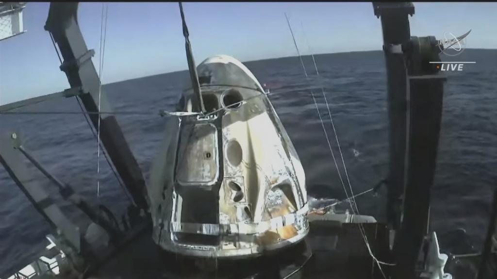 Crew-8 astronauts wave after splashdown