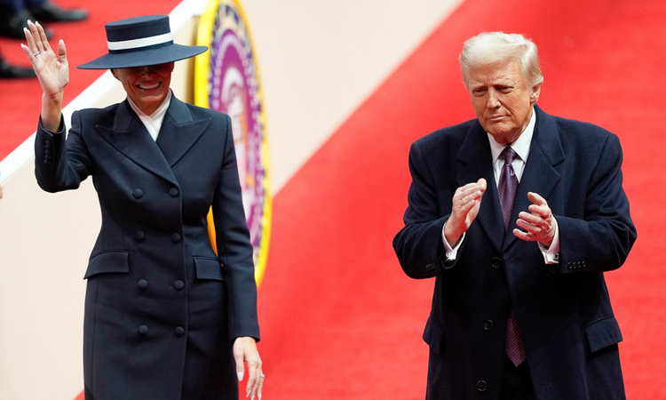 Ivanka Trump dressed elegantly in a green outfit at the inauguration