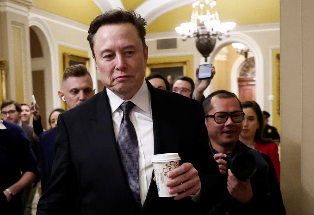 Elon Musk engages with the media over political issues