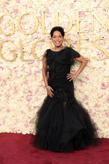 Ali Wong in a beautiful red chiffon dress at the Golden Globes 2025